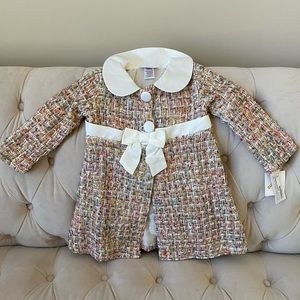 Tweed jacket and matching tutu dress.